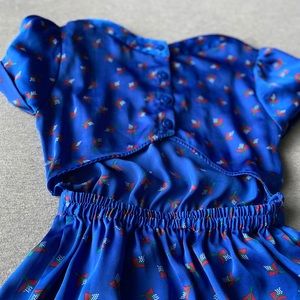 silky blue open back pleated dress